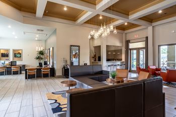 Common room with fancy lights at Grand Villas at Cinco Ranch, Katy